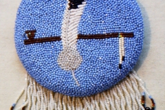 Thelma35-feather-pipe-medallion